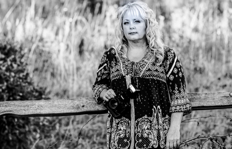 Self portrait of photographer with camera