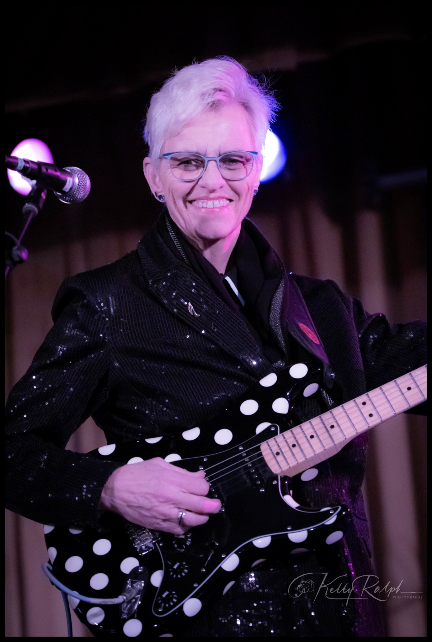 Portrait with blurred city lights in background